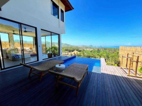 Above The Coconuts - Villa Woodside Kuta Central